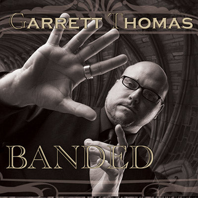 Banded 25 mm by Garrett Thomas and Kozmomagic